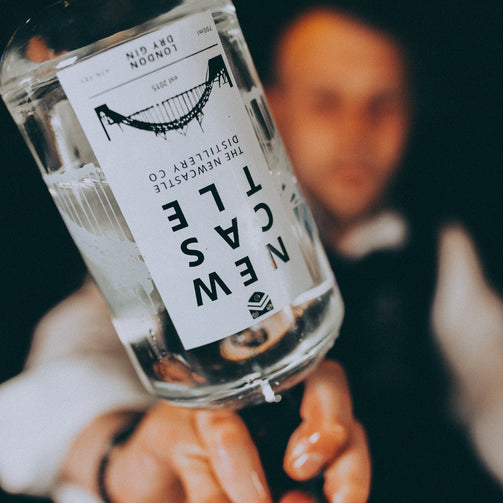 Newcastle Gin Bottle being poured